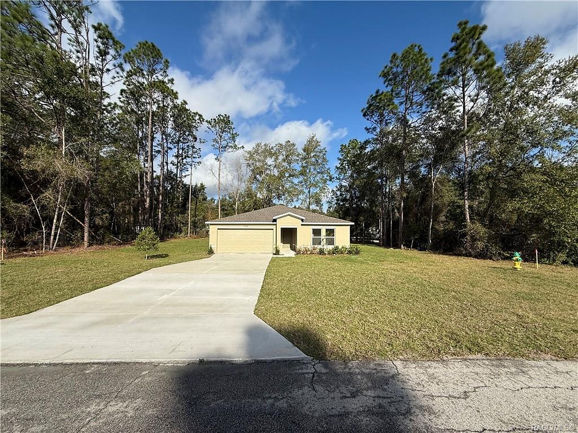 Newly built rental home set back from the road on a wooded Citrus County lot